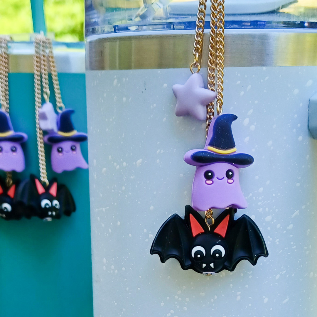 Fun Halloween themed tumbler charm. Includes three beads, a bat, a ghost and a star. Each of our tumbler charms slides easily onto most tumbler straws. Collect them all!