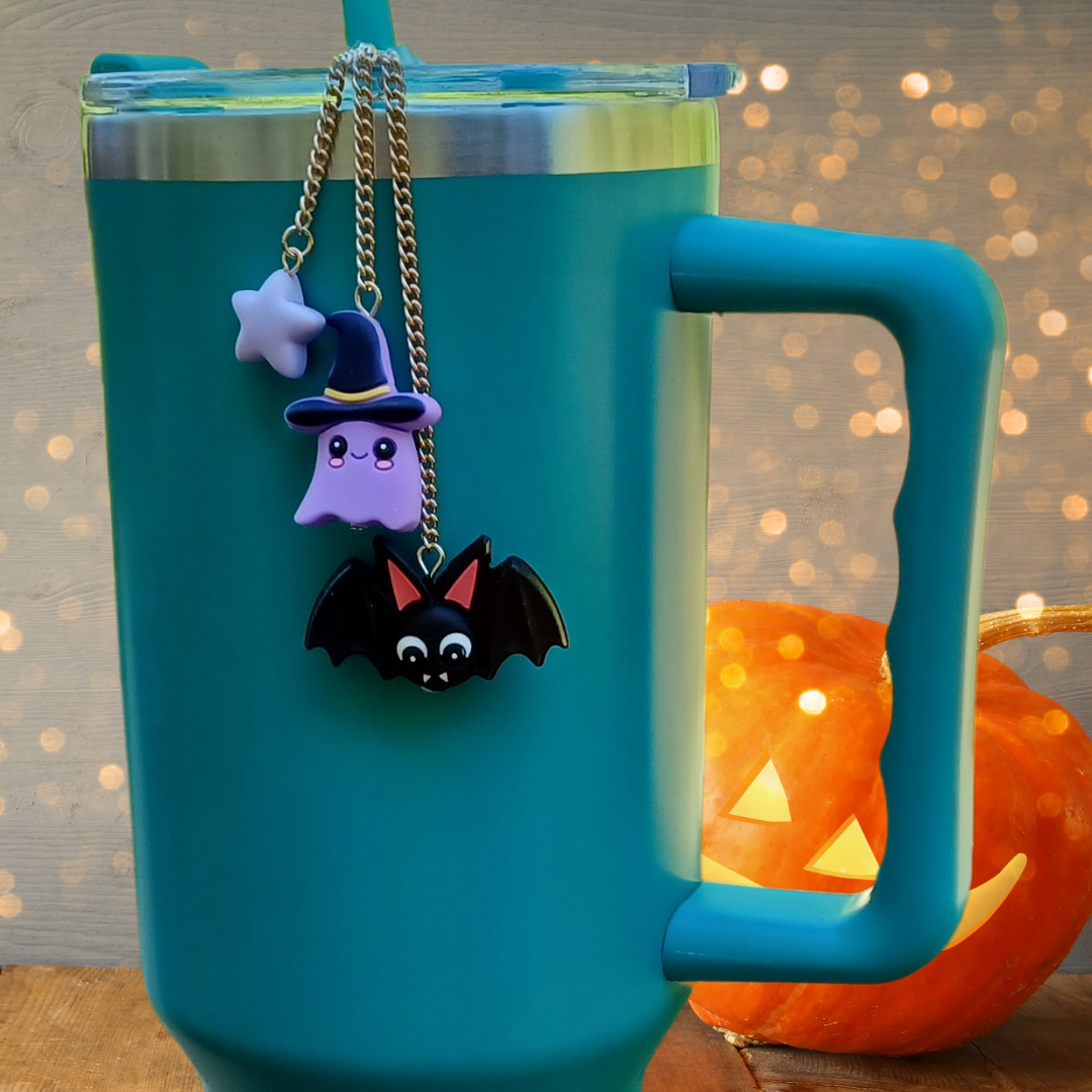 Fun Halloween themed tumbler charm. Includes three beads, a bat, a ghost and a star. Each of our tumbler charms slides easily onto most tumbler straws. Collect them all!